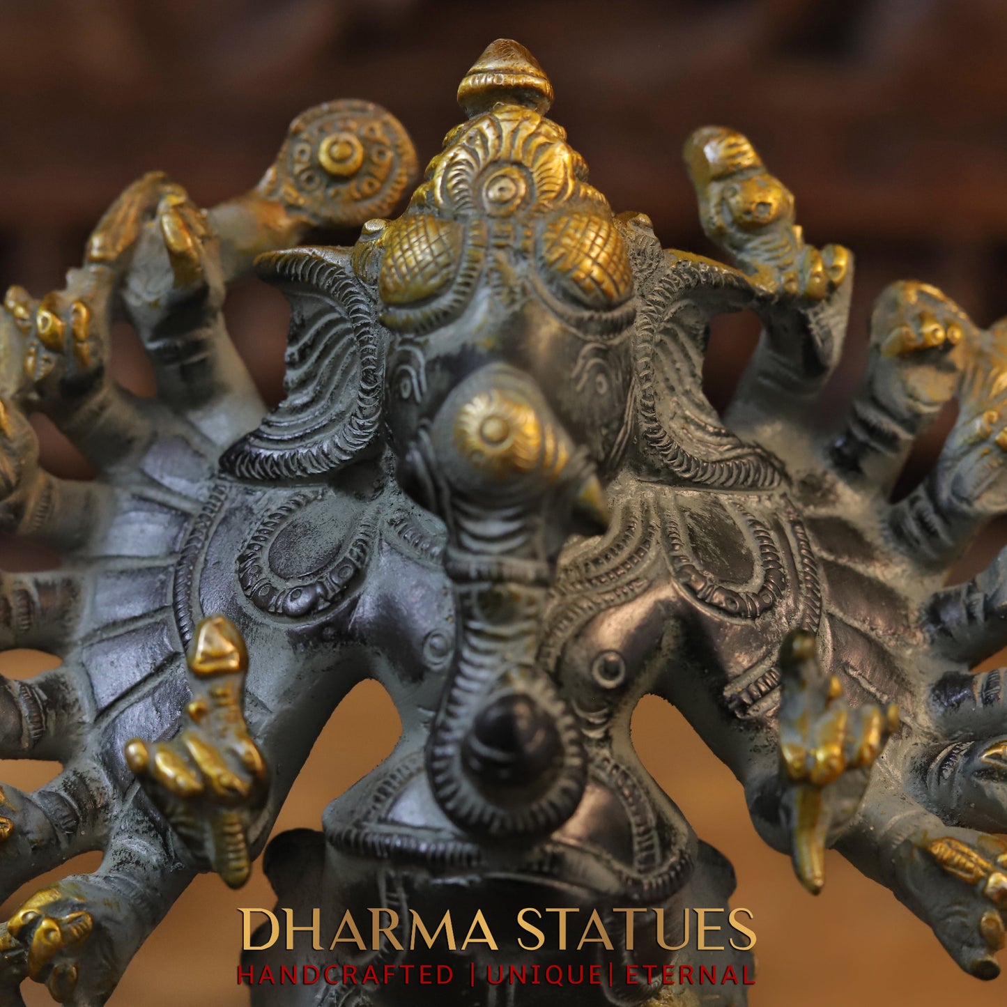 Brass Sixteen-Armed Vira-Ganesh, Black & Golden Finish, 9"
