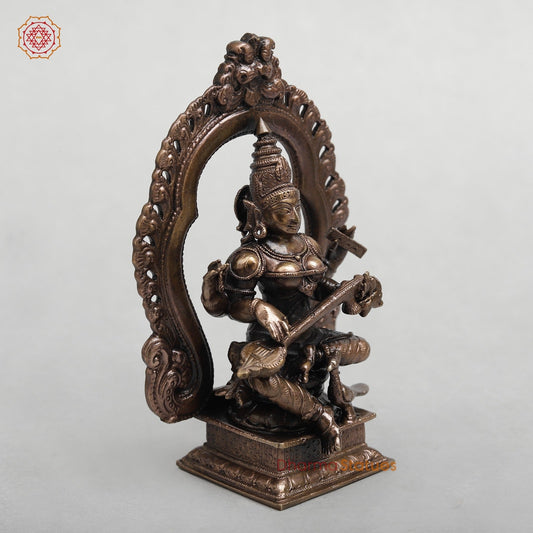Copper Saraswati Seated With Arch 5.5”