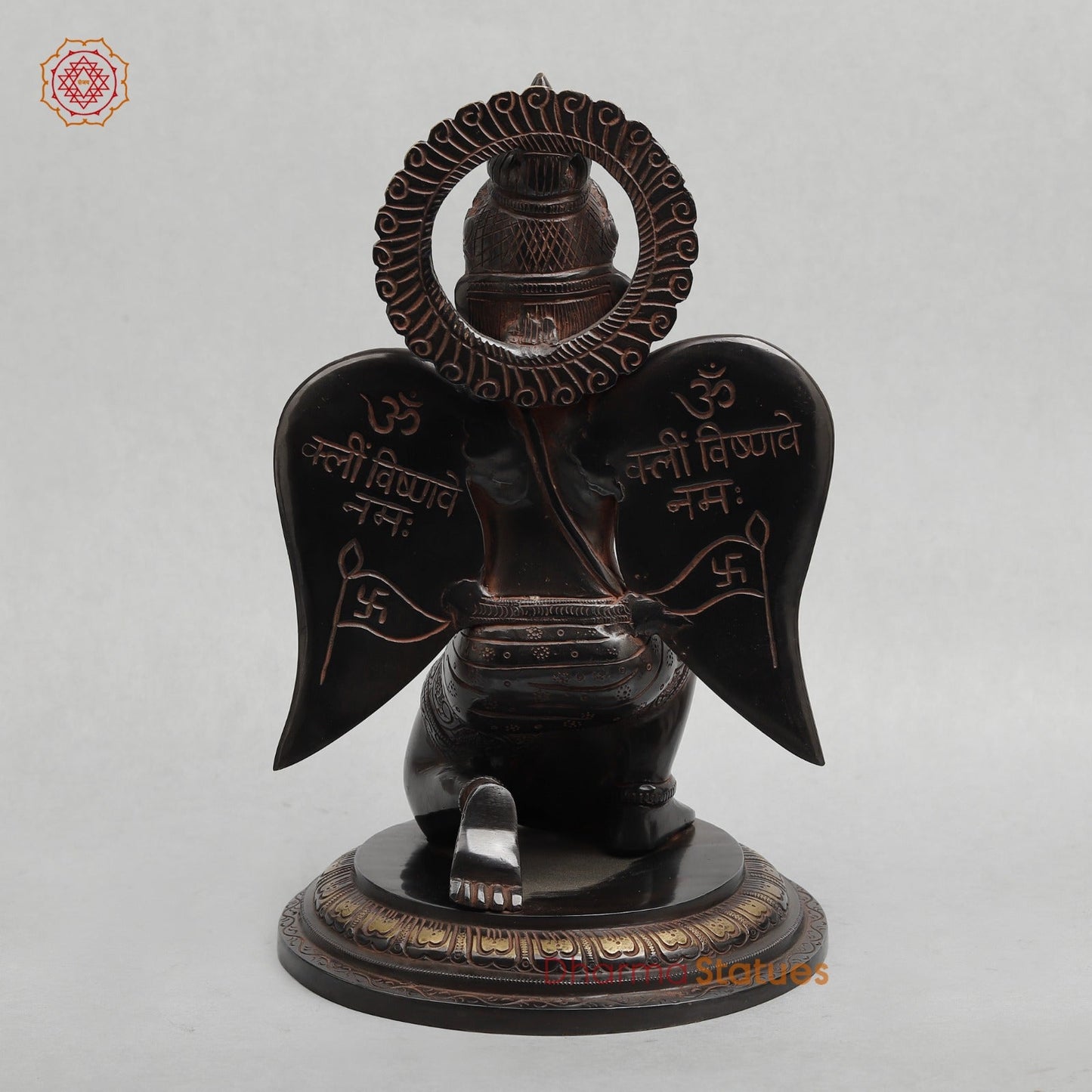 Brass Garuda Seated With Mantra in the Wings Fine, Royal Black with Red Hues Finish 12”