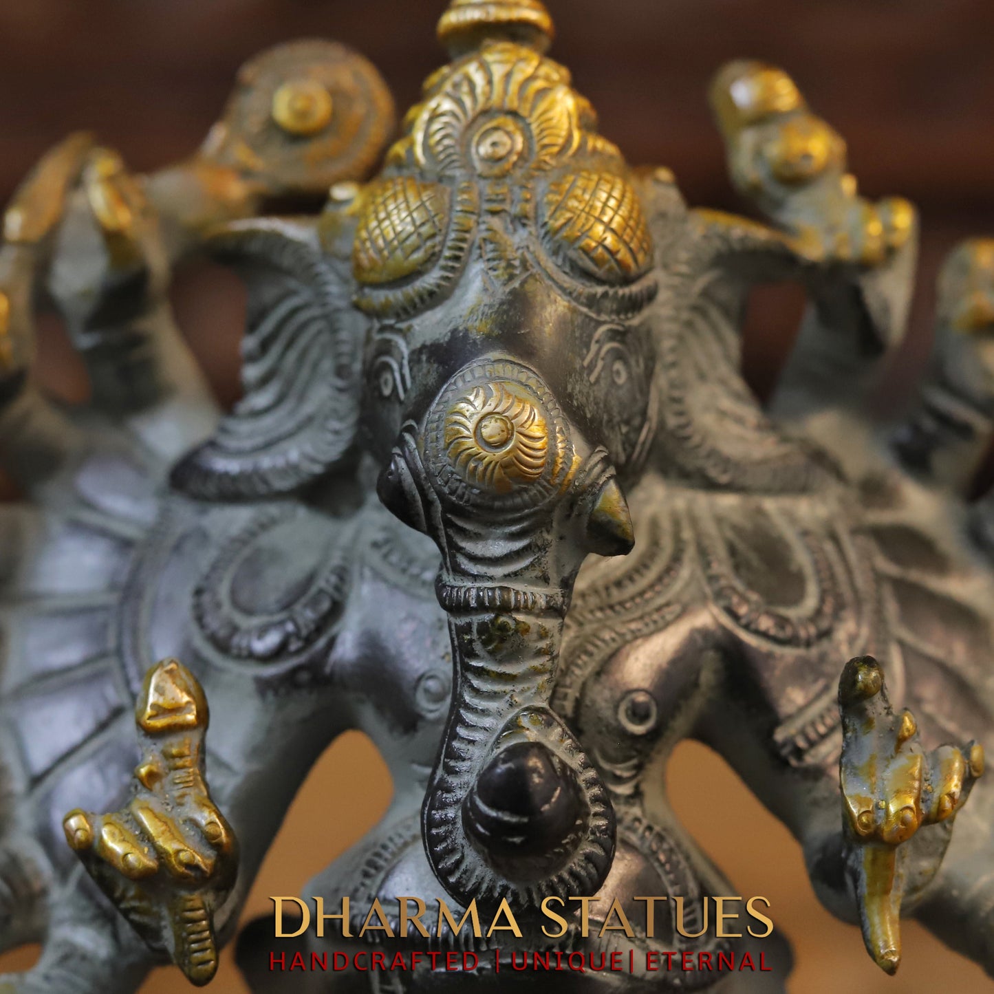 Brass Sixteen-Armed Vira-Ganesh, Black & Golden Finish, 9"