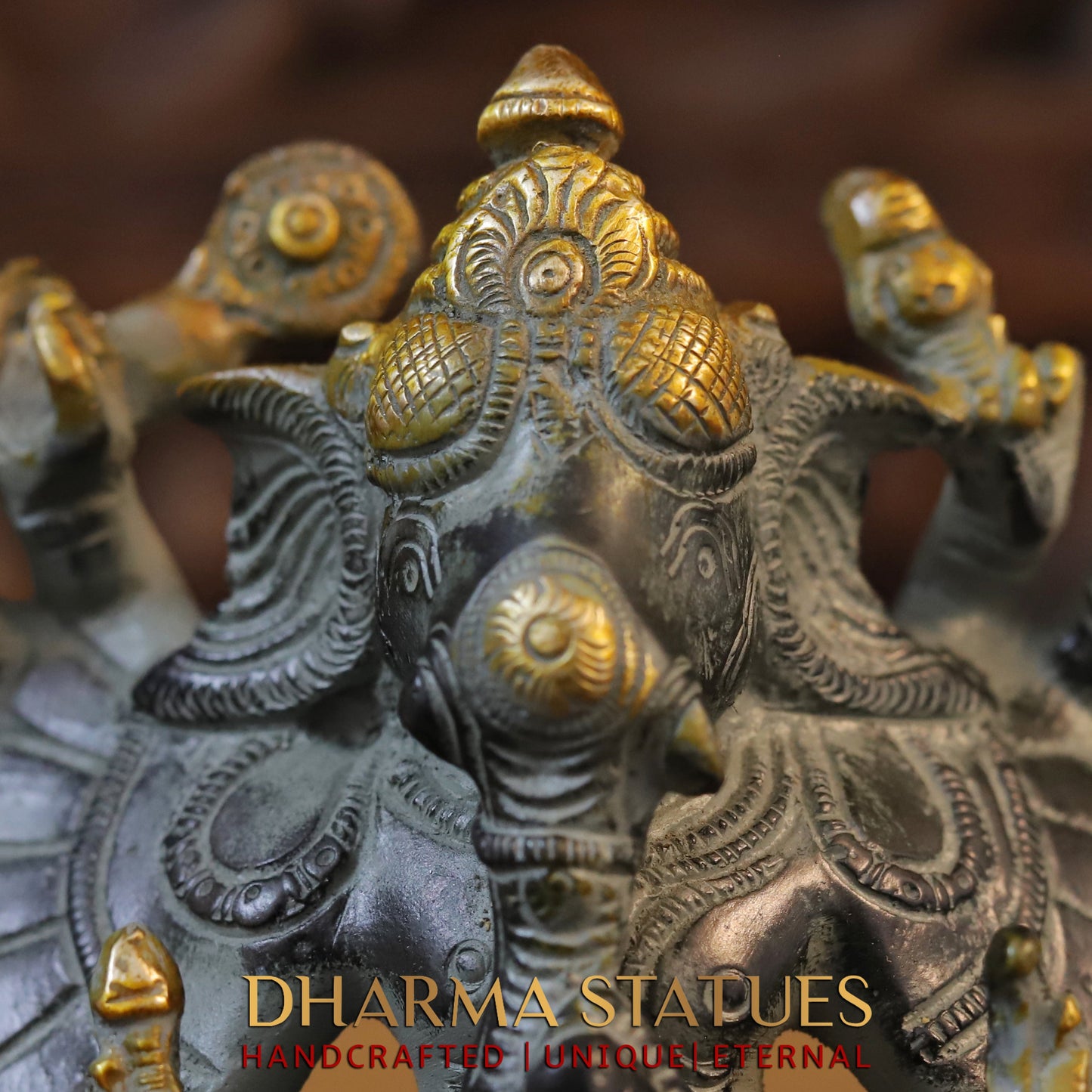 Brass Sixteen-Armed Vira-Ganesh, Black & Golden Finish, 9"
