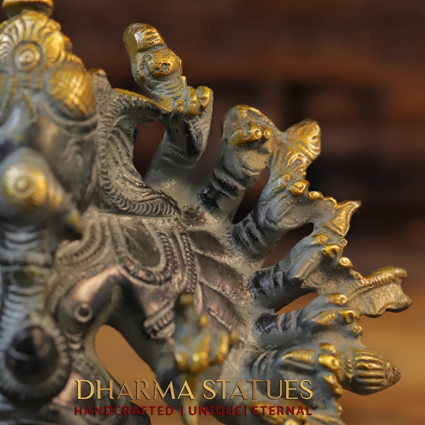 Brass Sixteen-Armed Vira-Ganesh, Black & Golden Finish, 9"