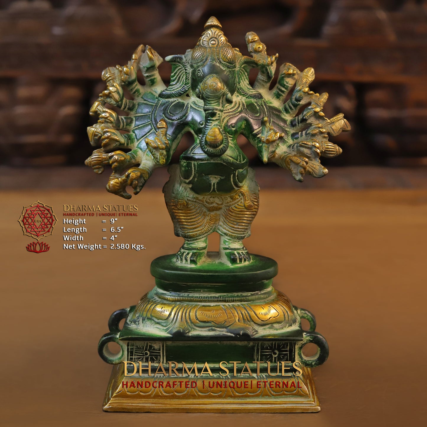 Brass Sixteen-Armed Vira-Ganesh, Green Patina & Golden Finish, 9"