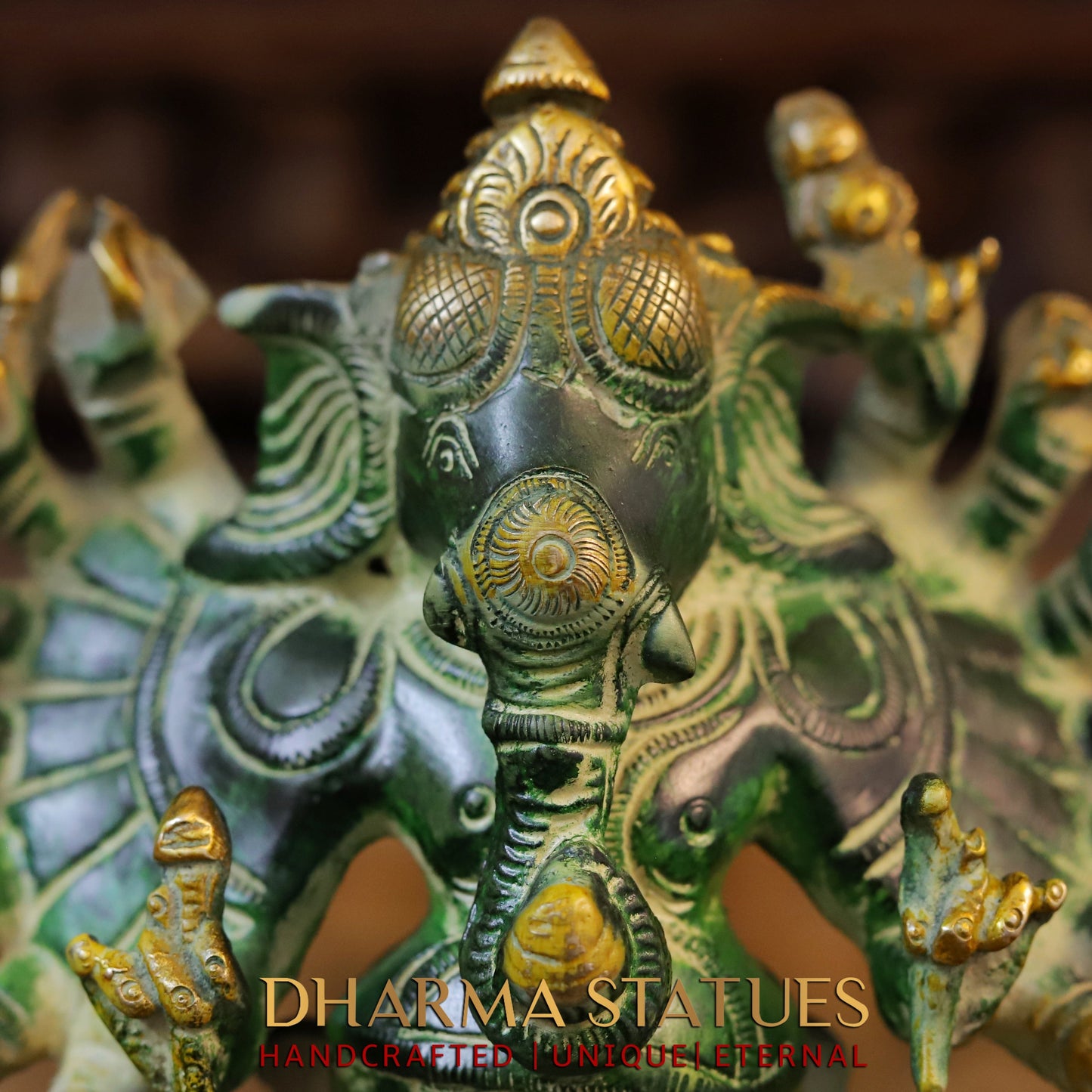 Brass Sixteen-Armed Vira-Ganesh, Green Patina & Golden Finish, 9"