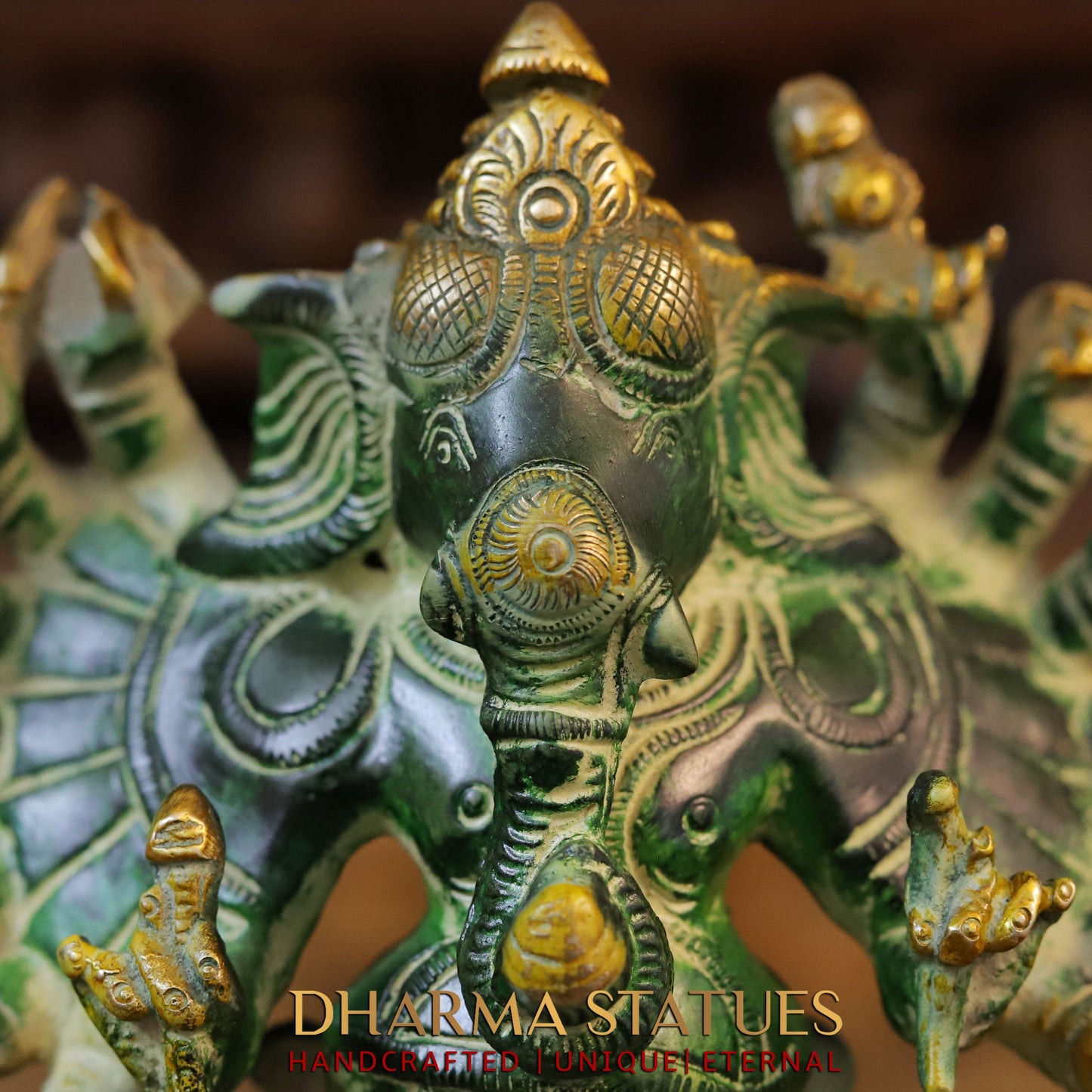 Brass Sixteen-Armed Vira-Ganesh, Green Patina & Golden Finish, 9"