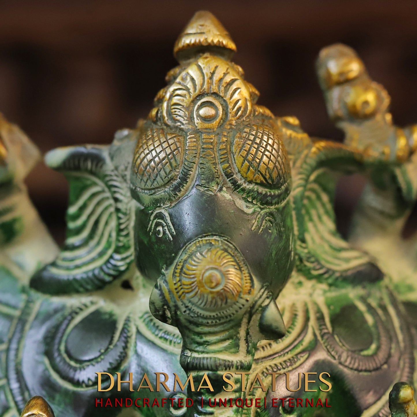 Brass Sixteen-Armed Vira-Ganesh, Green Patina & Golden Finish, 9"