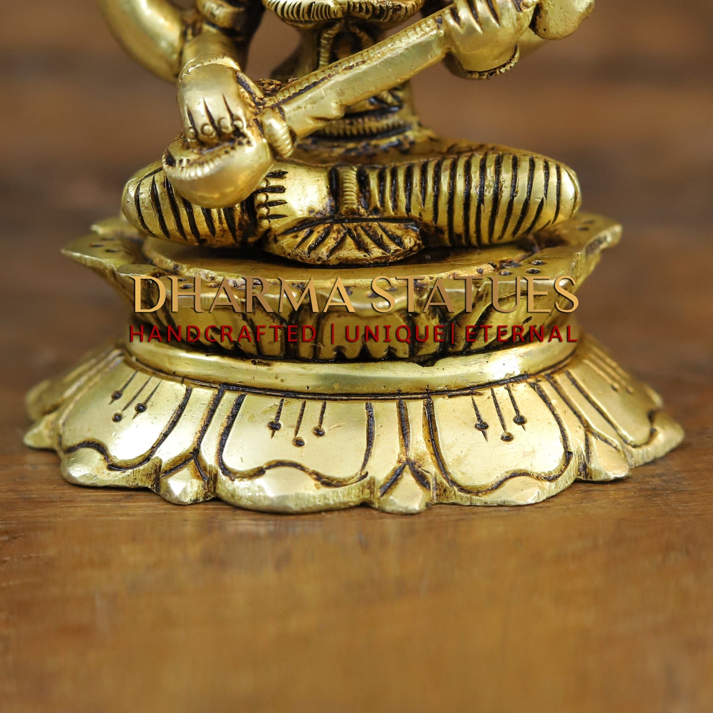 Brass Saraswati, Lakshmi and Ganesh seated on a Lotus, Golden Finish, 3.5"