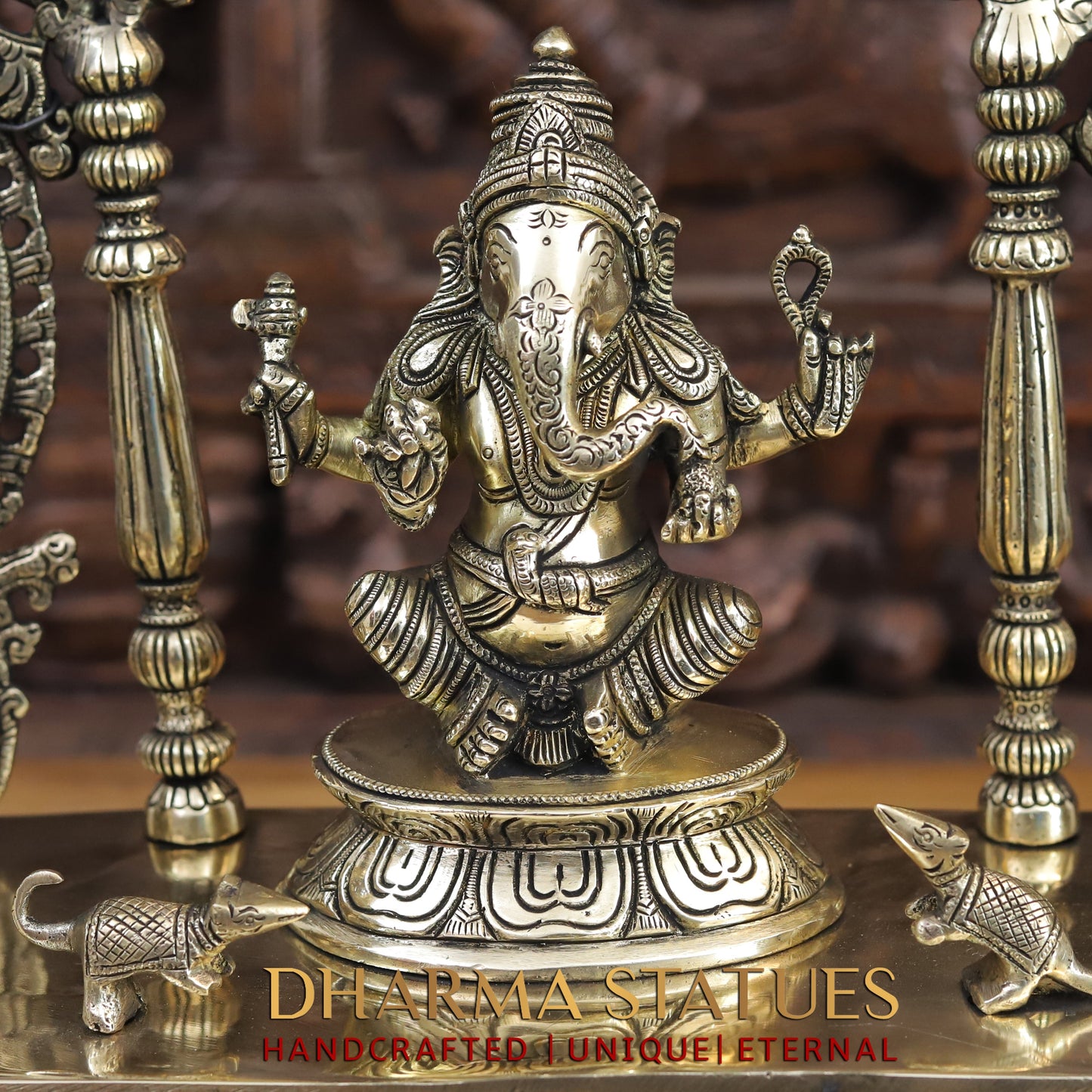 brass ganesh, lakshmi, and saraswati idols