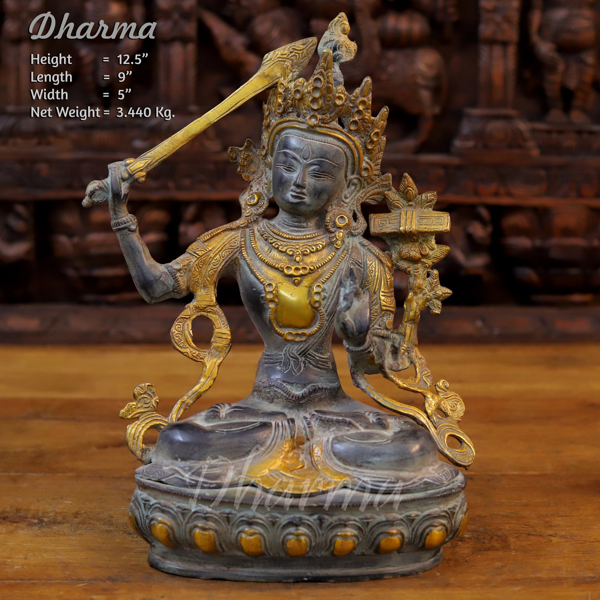 Brass Tara Idol, Seated on a Lotus, Holding a Sword, Black patina & Golden 12.5" front view