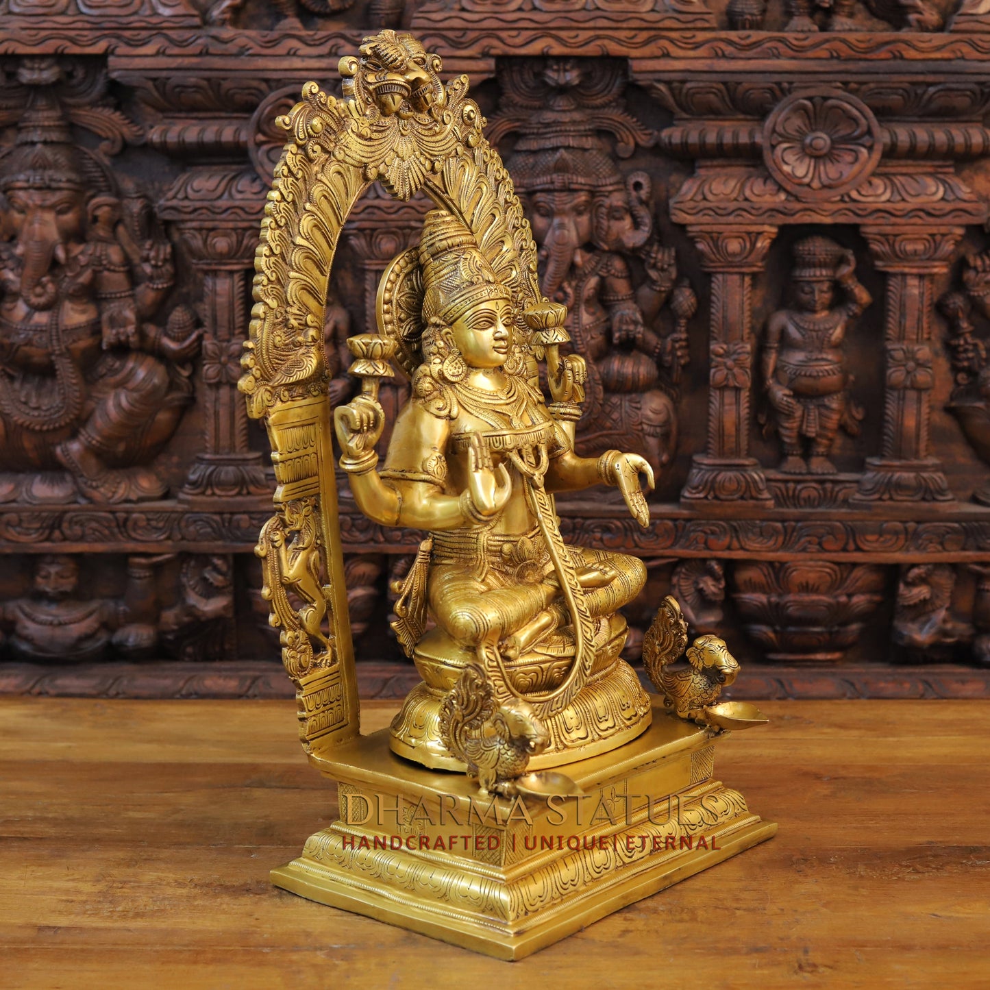 Brass Lakshmi Statue in Yaksha Frame with Peacock Diya, Fine Golden Finish 24"
