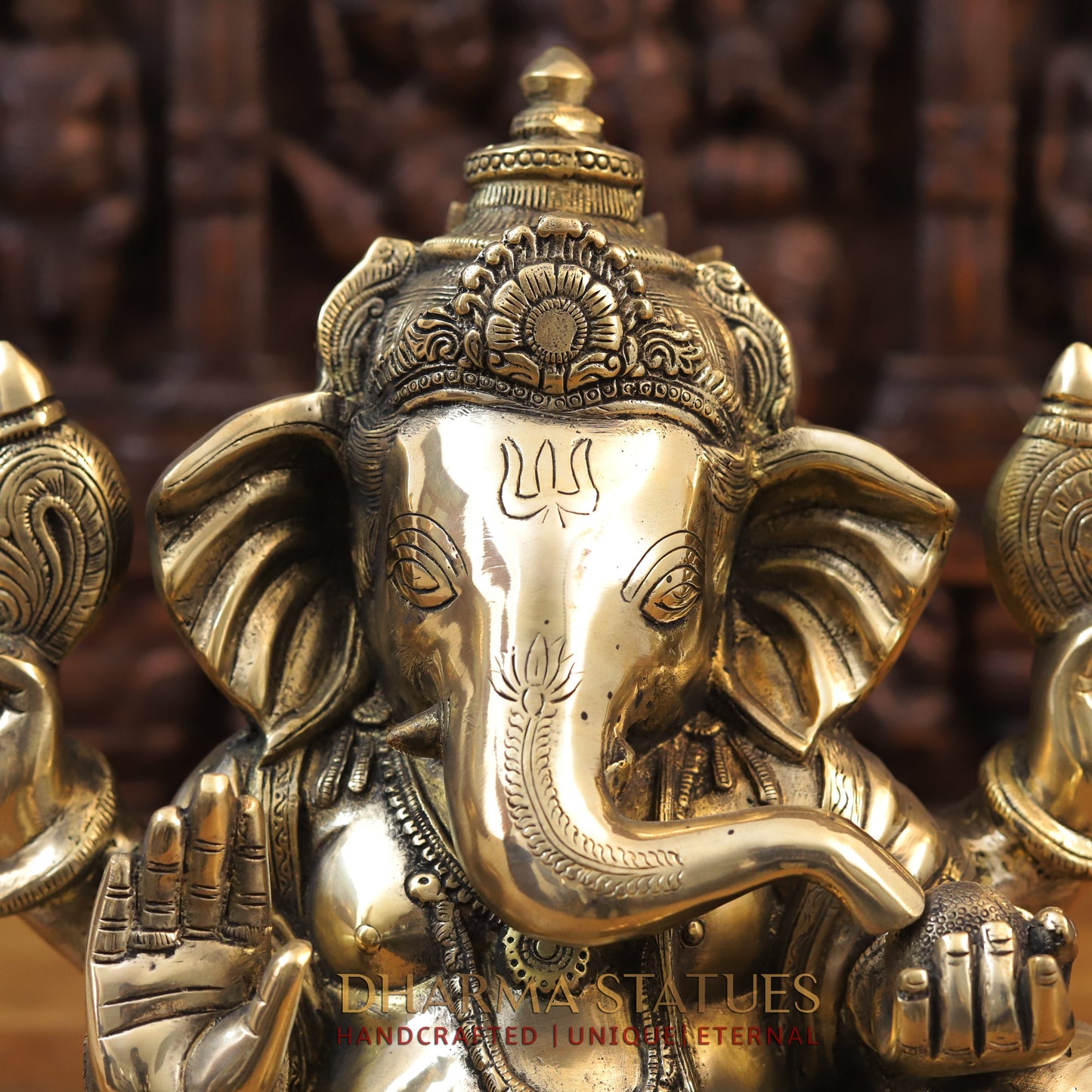 Brass Ganesh seated with tilted neck, Golden Finish, 13.5"