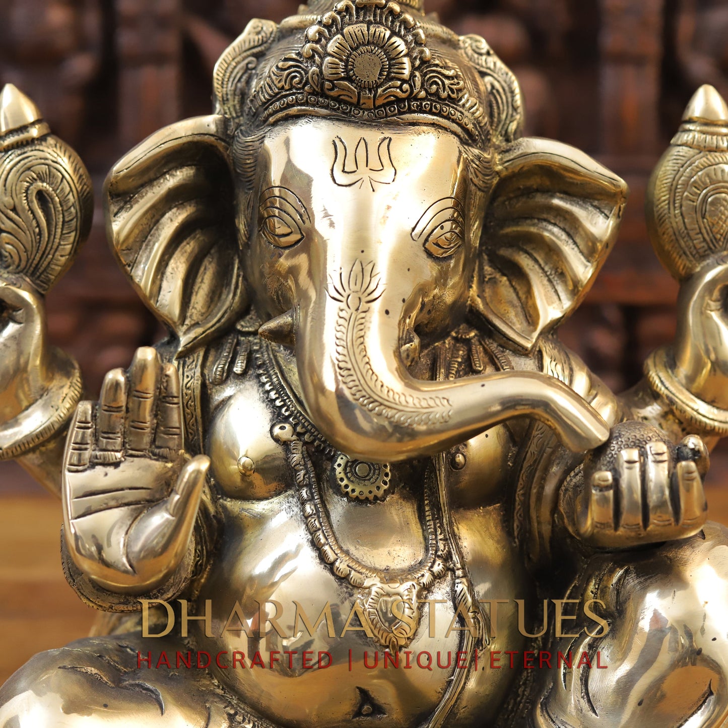 Brass Ganesh seated with tilted neck, Golden Finish, 13.5"