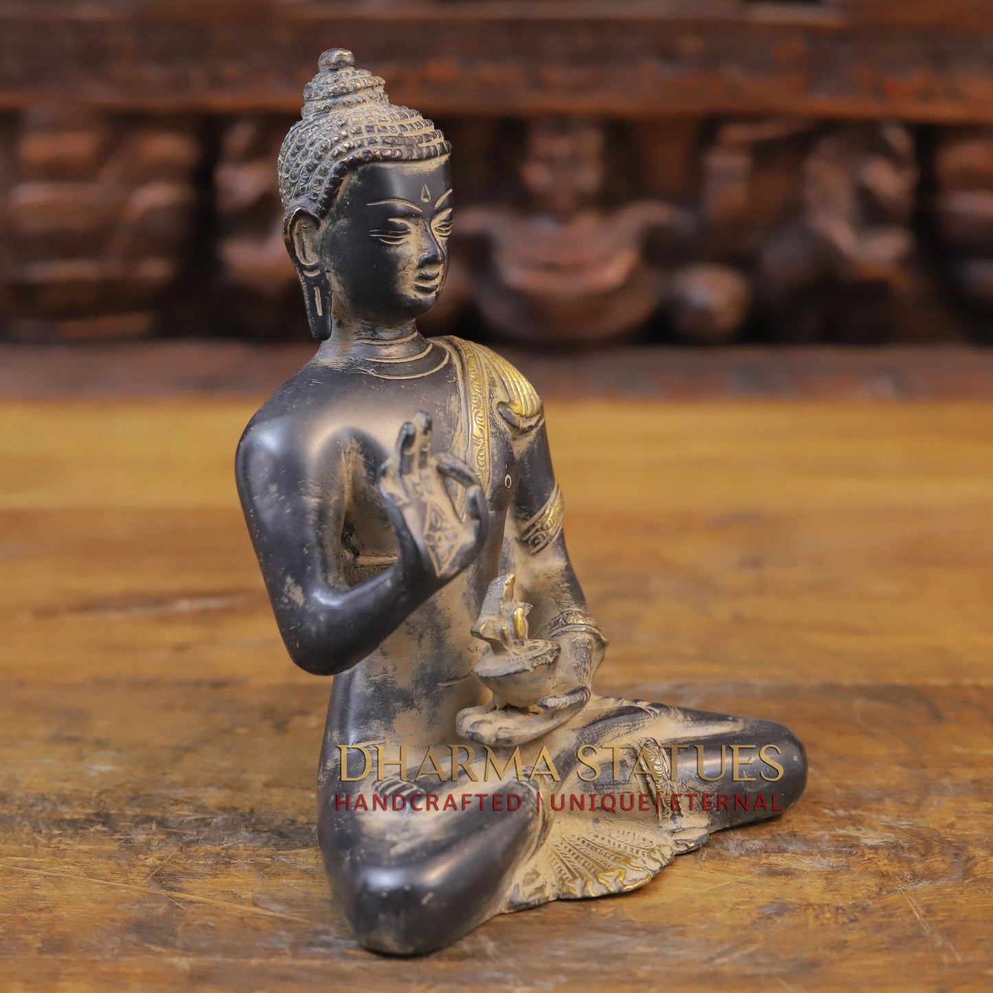 Brass Buddha seated in Blessing Posture, Black Patina & Golden Finish, 8"