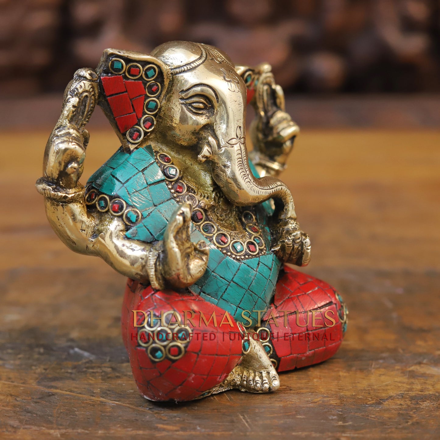 Brass Ganesh seated with tilted neck, Stone work, 5.5”