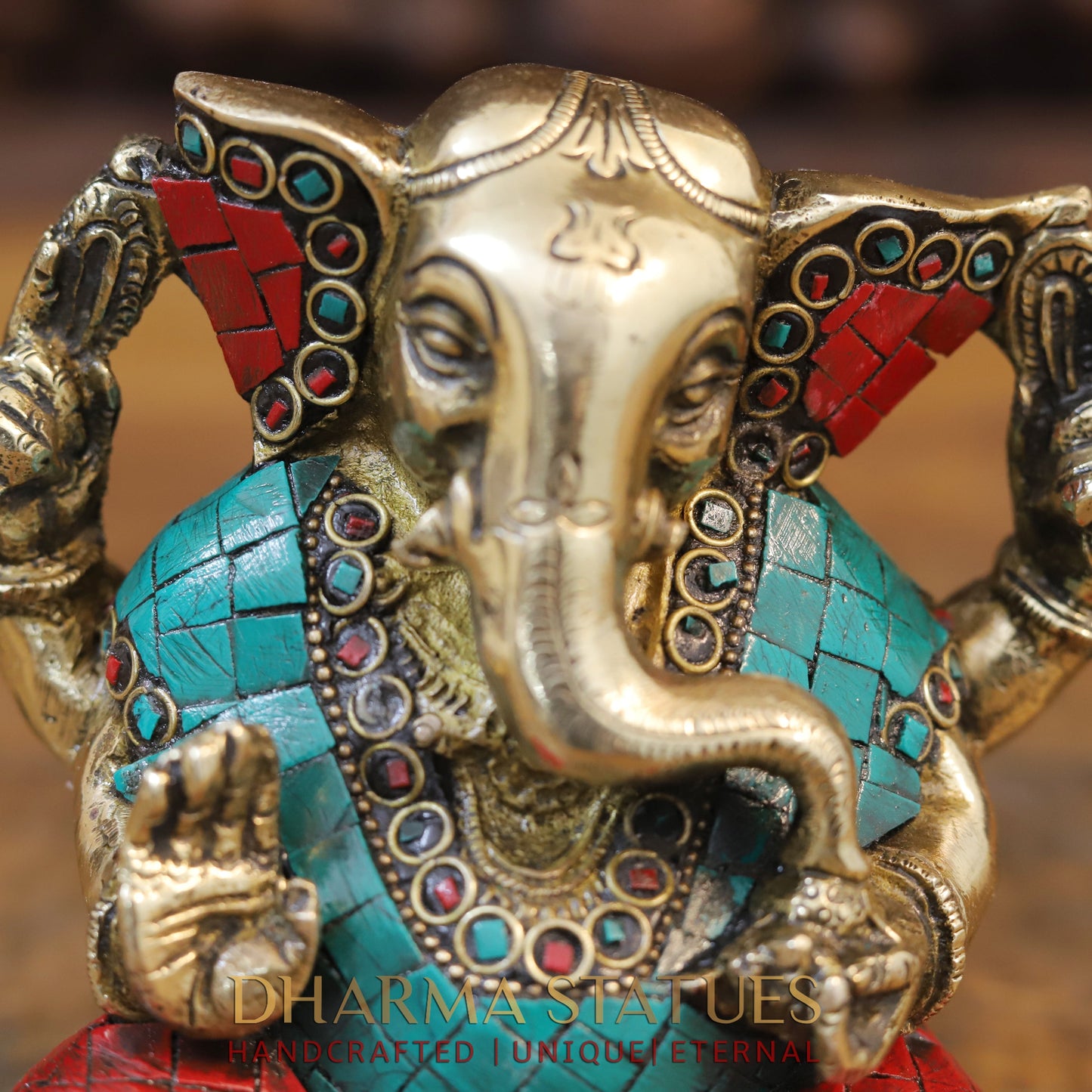 Brass Ganesh seated with tilted neck, Stone work, 5.5”