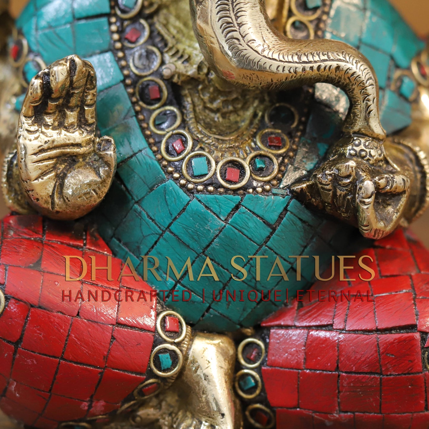 Brass Ganesh seated with tilted neck, Stone work, 5.5”