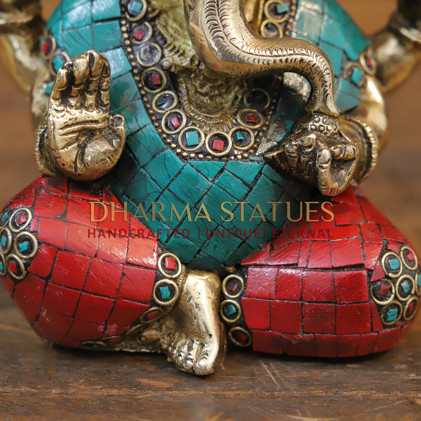 Brass Ganesh seated with tilted neck, Stone work, 5.5”