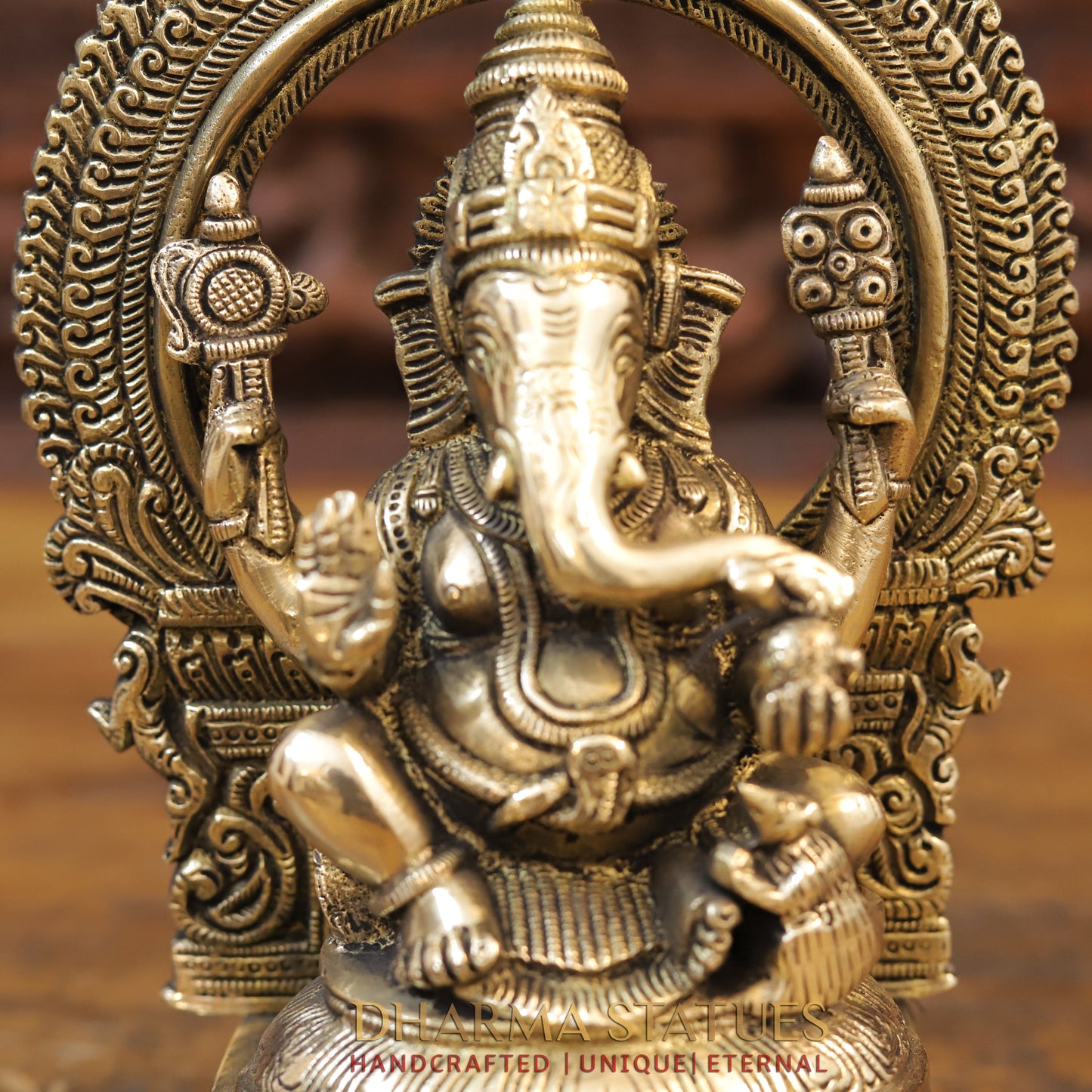 Brass Ganesh seated with Frame, Golden Finish, 10"