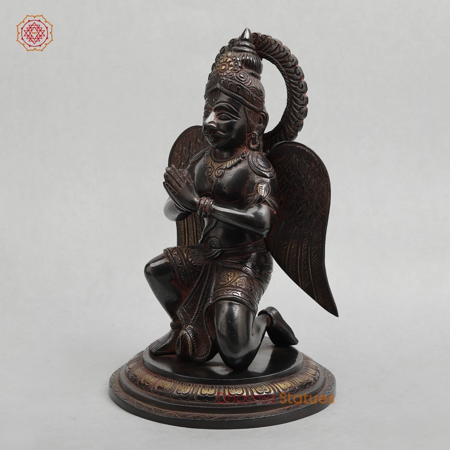 Brass Garuda Seated With Mantra in the Wings Fine, Royal Black with Red Hues Finish 12”