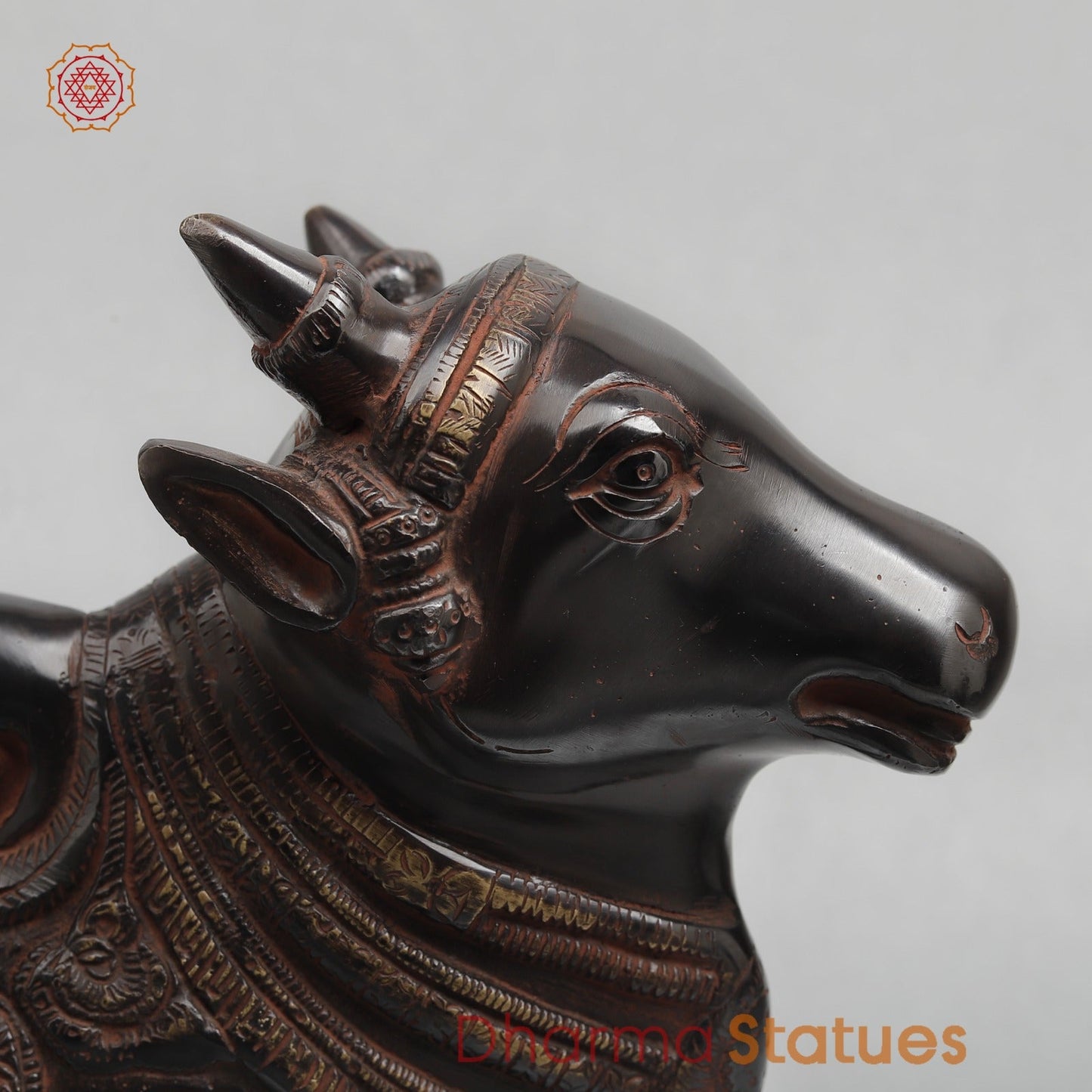 Brass Nandi seated Fine, Royal Black with Red Hues Finish 11”