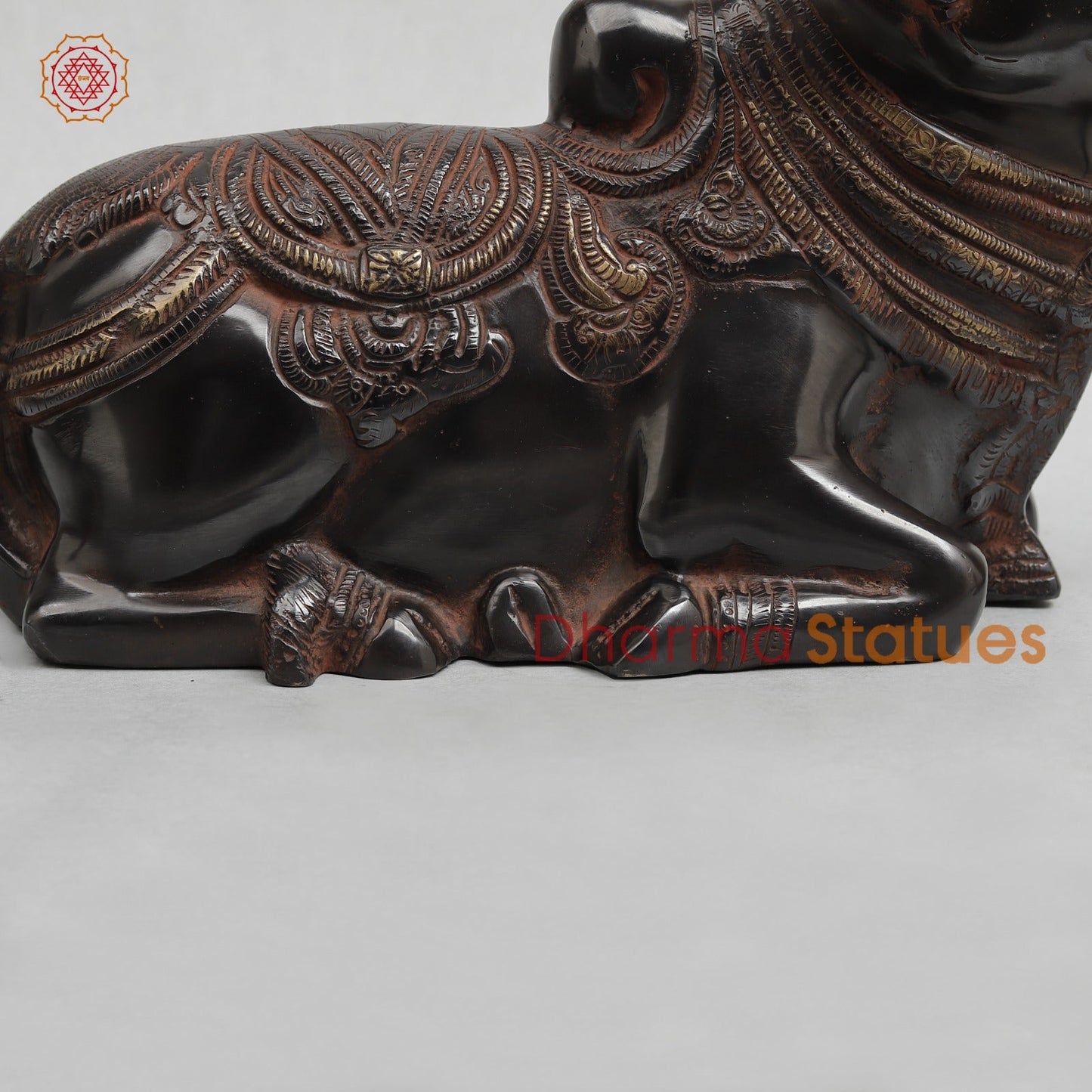 Brass Nandi seated Fine, Royal Black with Red Hues Finish 11”